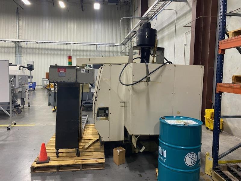 Okuma LU15 CNC Lathe, 2002 – Tailstock, Chip Conveyor