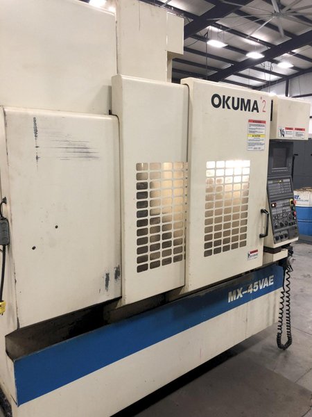 OKUMA MX-45 VAE CNC VERTICAL MACHINING CENTER. STOCK # 1300720