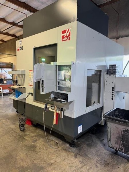 Haas UMC-750 5-Axis VMC, 2022 – 30” Travels, 15K Spindle, 50+1 Tools, TSC &amp; Chip Conveyor (1)