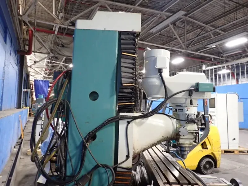 SOUTHWESTERN INDUSTRIES INC 10" X 50" CNC VERTICAL MILL  -  SB3