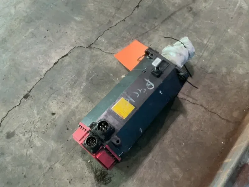 FANUC 17 AMPS AM30/3000 AC SERVO MOTOR   -  A06B-0166-B675#S016