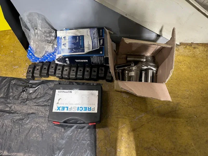 2023 DN SOLUTIONS PUMA 4100LMB CNC Universal Turning Center. Equipped for versatile 2-axis and 3-axis lathing, it features a 15" chuck, 50 HP spindle, and a machining length of 79.8" and with hydraulic open / close steady rest. Perfect for heavy-duty tasks. Fanuc Control, 50HP