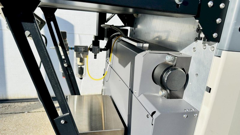 Automated Packaging Systems | Autobag 600 Bagger System  |  Vertical Orientation for Package Fulfilment with Powered Outfeed Conveyor