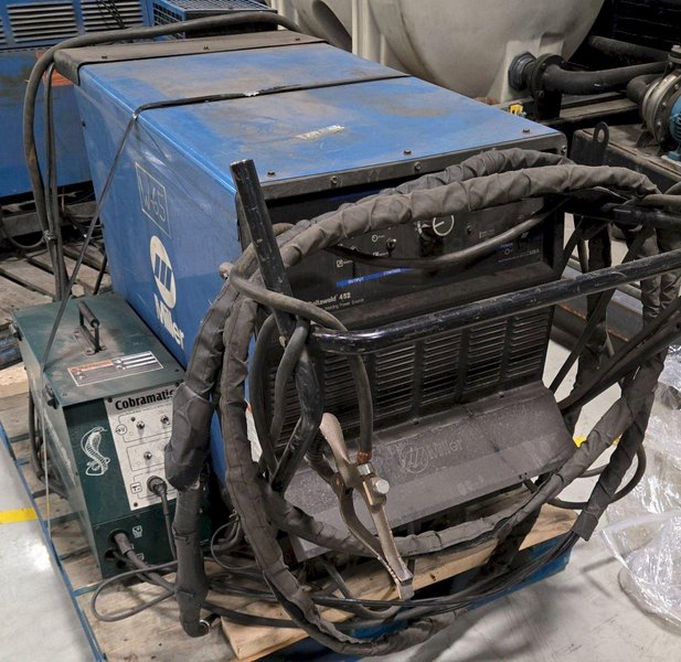 MILLER DELTAWELD 452 WITH WATERMATE 1A COOLING SYSTEM AND  WIRE FEEDER USED