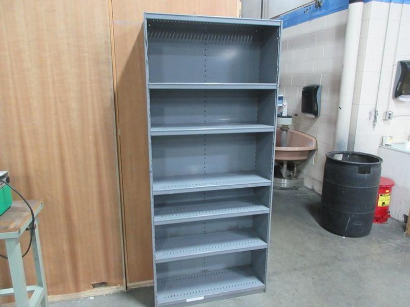 Metal Shelf Unit with 6 Adjustable Shelves- Auction Item