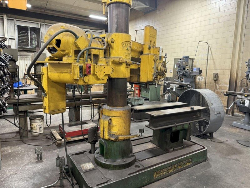 4' X 11" CARLTON RADIAL ARM DRILL. STOCK # 1114024.