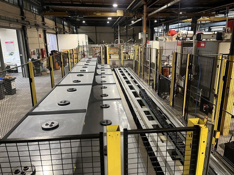 Fanuc Robot + 3 Breton machining centers 5 axes