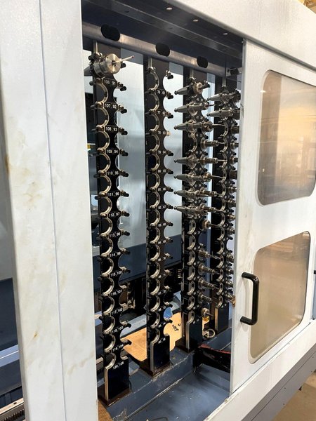 Matsuura MAM72-63V PC2 5-Axis VMC 2009, Matsuura G-Tech 301 CNC Control, 2 Pallets, 5th Axis, 12,000RPM, 120 ATC Expandable, Through Spindle Coolant, Rigid Tapping, Probe, Laser Tool Measure.