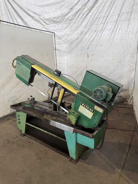 9" X 16" DOALL C-916 HORIZONTAL BANDSAW W/ 10' X 18" CONVEYOR. STOCK # 0112526.