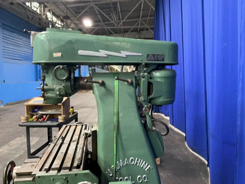THE UNITED STATES MACHINE TOOL CO. 10”X42” VERTICAL MILL  -  V