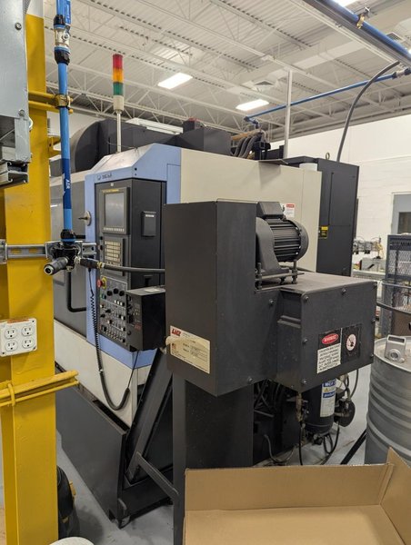 Doosan DNM500 VMC, 2008 – Chip Conveyor