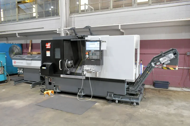 USED HAAS 21" X 32.5" CNC LATHE MODEL ST-30 WITH HAAS V2 BARFEEDER