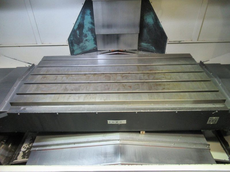 Doosan Mynx 6500/40 CNC Vertical Machining Center with Doosan-Fanuc i Series CNC Control,  30-ATC Thru Spindle Coolant, 12,000 RPM, CAT 40,- Auction Item