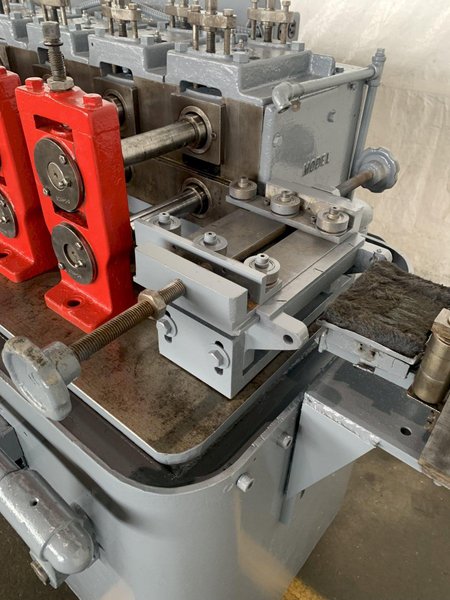 10 STAND X 1-1/2" X 8" TISHKEN MODEL 10LE 1-1/2 ROLLFORMER. STOCK # 0789324