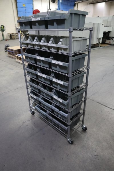 Rolling Wire Rack, (7) Shelves with Plastic Bins 36"x14"x55"- Auction Item