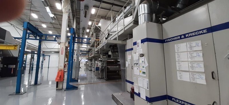 55″ Fischer &amp; Krecke Flexpress 16S – 8-Color CI Flexographic Printing Press w/ Laminator, Gravure, Flying Splice Unwinds/Rewind