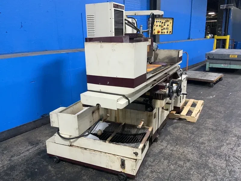 FALCON CHEVALIER MACHINERY INC. 12”X23.5” TABLE SURFACE GRINDER  -  FSG-1228AD