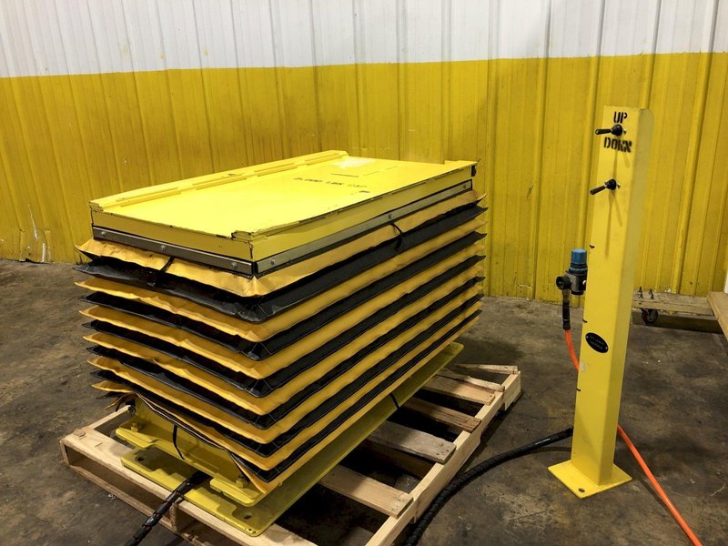 1,500 LBS TOPPER INDUSTRIAL MODEL D-MD/LR PNEUMATIC AIR LIFT TABLE: STOCK #17581