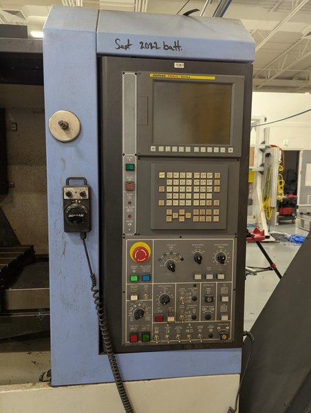 Doosan DNM500 VMC, 2008 – Chip Conveyor