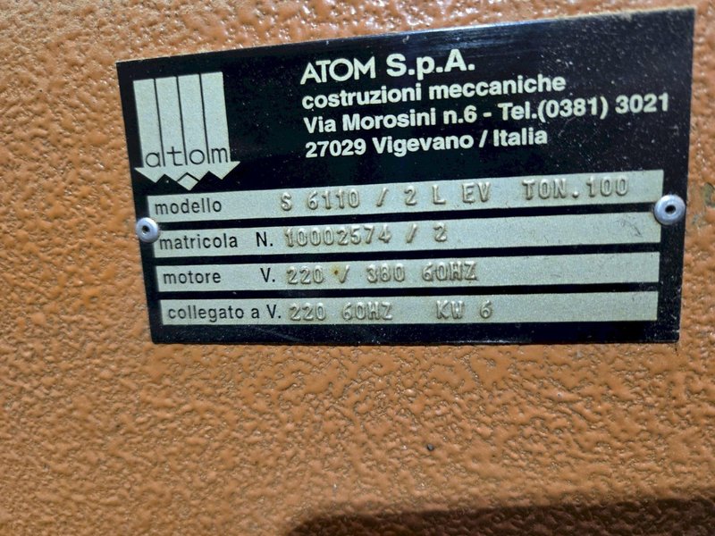 100 TON ATOM S 6110 / 2 L EV DIE CUTTING PRESS W/ UNWIND STATION. STOCK # 0772526