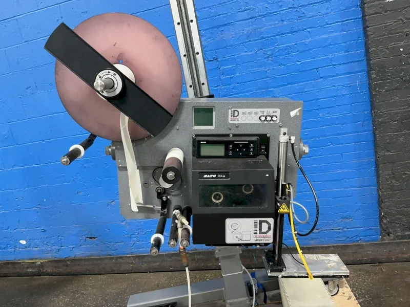ID TECHNOLOGY 14” OUTSIDE DIAMETER / 3” INSIDE DIAMETER CORE PRINT AND APPLY LABELER  -  252