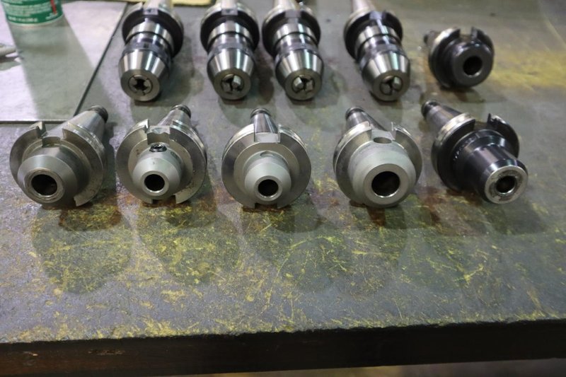 CT40 Taper Tool Holders: (4) Nikken NPU-13 Keyless Drill Chucks, (6) End Mill Holders- Auction Item
