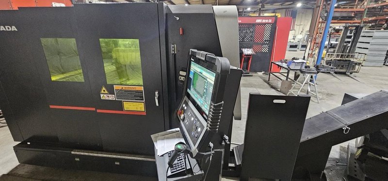 12,000 Watt Amada Regius 3015AJ Fiber Laser, 2023 – 5’x10′, Low Hours,  W/ AMS3015CL Single Pallet Automation