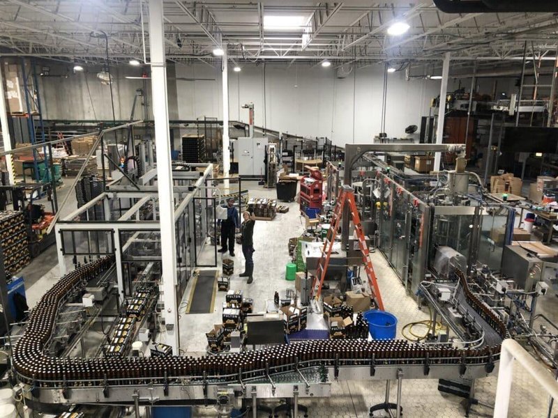 Krones Kosme 150 BPM Complete Bottling Line, 2014 – 28-Valve Filler, 7-Head Capper, Labeler, Depalletizer &amp; Case Packer