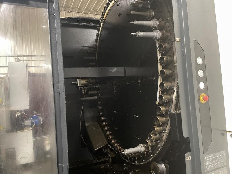 DMG Mori NHX5000 CNC Horizontal Machining Center with Pallet Changer, High Pressure Thru-Spindle Coolant, 60 Station Tool Changer, 50 HP High Torque 15,000 RPM Spindle