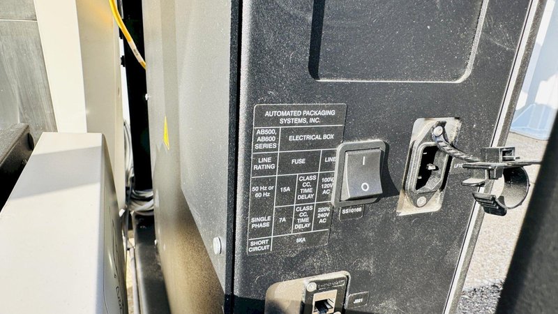 Automated Packaging Systems | Autobag 600 Bagger System  |  Vertical Orientation for Package Fulfilment with Powered Outfeed Conveyor