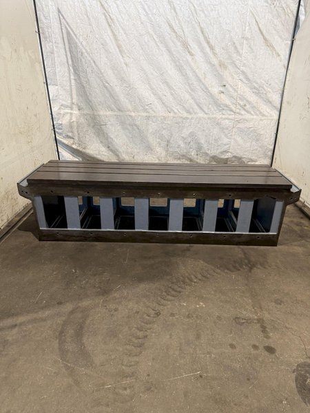 25" WIDE X 89" LONG X 24.5" TALL T-SLOTTED TABLE. STOCK # 0778825