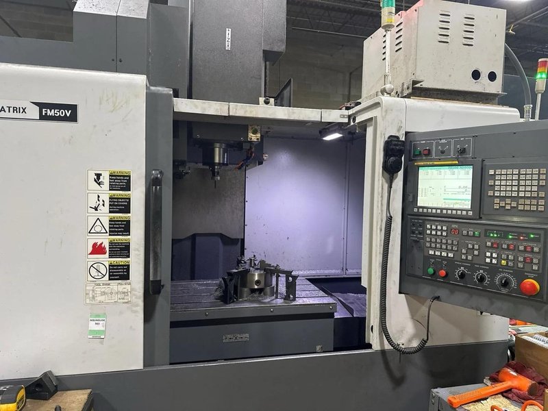 DMC Matrix FM50V VMC, 2012 – Fanuc Oi-MD Control, Chip Conveyor