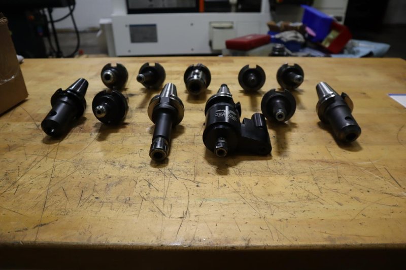 Command CT 40 Taper Tool Holders: (1) Tapmatic Head, (1) ER20 Collet Holder, (9) End Mill Holders- Auction Item