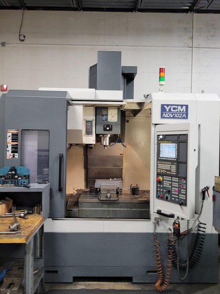 YCM NDV102A CNC VMC; 15K RPM, Trls: 40x 23.6x 23.6, Big Plus CAT 40, Die Mold, Fanuc MXP200FB, 30HP, New 2011 (Low Hours)