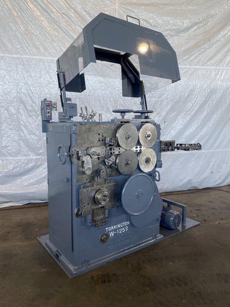 .250&quot; TORRINGTON #W125S SPRING COILER W/ TORSION ATTACHMENT. STOCK # 0526122