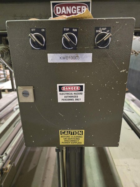 100 TON ATOM S 6110 / 2 L EV DIE CUTTING PRESS W/ UNWIND STATION. STOCK # 0772526