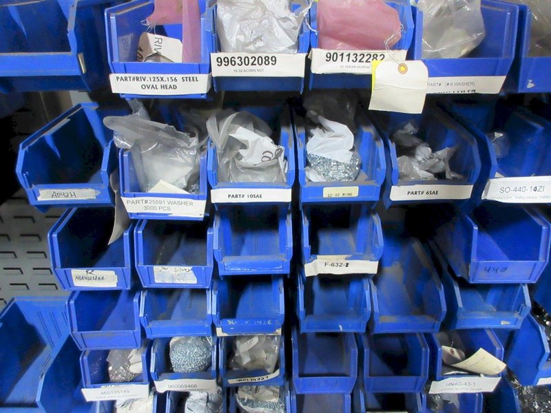 Plastic Bins Mounted to Wall with Contents of Assorted Hardware and Fasteners- Auction Item