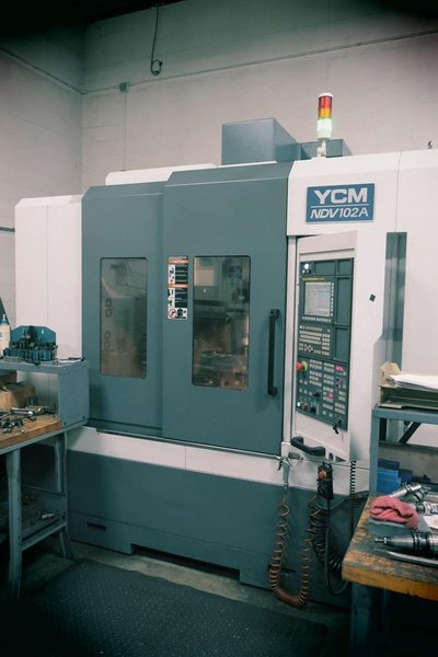 YCM NDV102A CNC VMC; 15K RPM, Trls: 40x 23.6x 23.6, Big Plus CAT 40, Die Mold, Fanuc MXP200FB, 30HP, New 2011 (Low Hours)