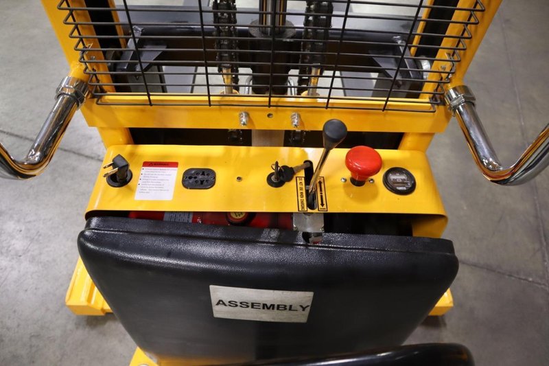 Uline H-5439 Electric Straddle Stacker Lift, 2,200# Cap, 63" Max Height, 50" Between Outriggers, 12 Volt Battery with Charger, 42" Forks- Auction Item