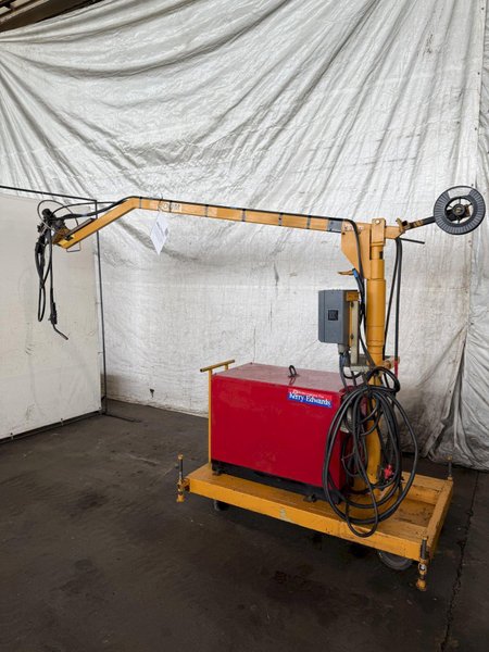 LINCOLN IDEALARC PULSE POWER 500 WELDER W/ BOOM AND LINCOLN LN-9F WIRE FEEDER. STOCK #0627922.