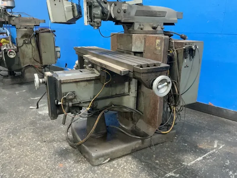 BRIDGEPORT 11” X 58” VERTICAL MILL