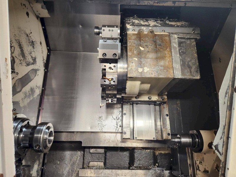 Doosan Puma 240B CNC Lathe, 2005 – Bar Feeder, Tailstock, Parts Catcher