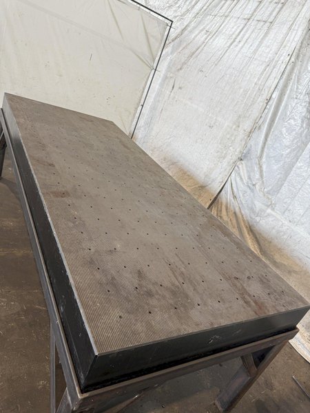 124&quot; X 50&quot; STEEL DRILLED &amp; TAPPED LAYOUT TABLE W/ STAND. STOCK # 0667025.