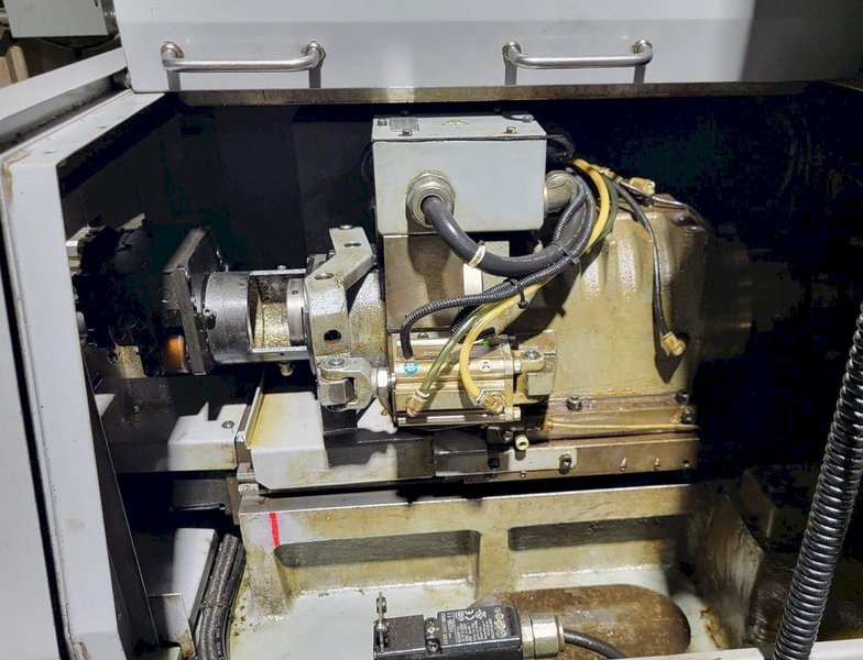 Tsugami B0205-II 5-Axis CNC Swiss Lathe, 2013 – Fanuc OI-TD Control, Edge Bar Feeder, High Pressure Coolant, Chip Conveyor