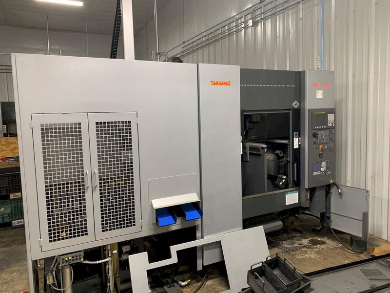 Takamaz XW-130 Twin-Spindle CNC Turning Center, 2016 – GTH150 Gantry Loader, Fanuc 0i-TD &amp; 16-Station Stocker