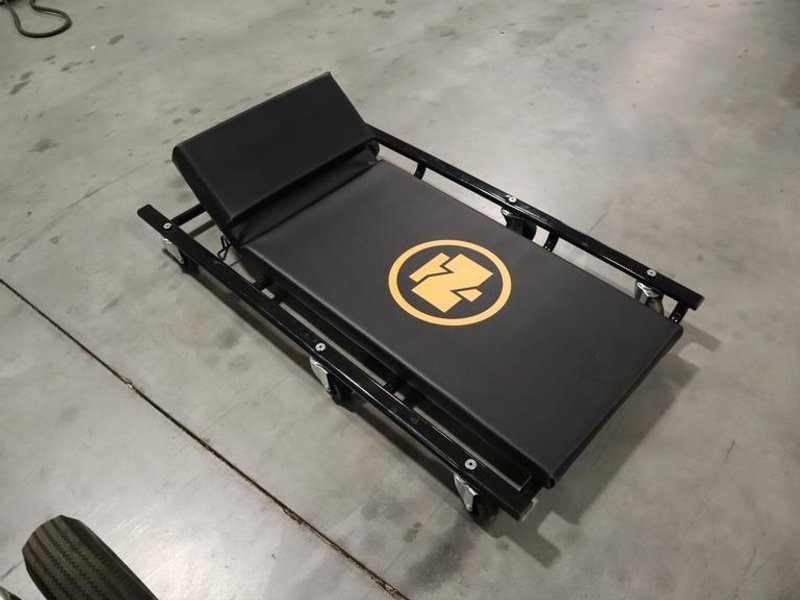Northern Tool 44" Wide Cushion Creeper with 6 Swivel Wheels and Adjustable Head Rest- Auction Item