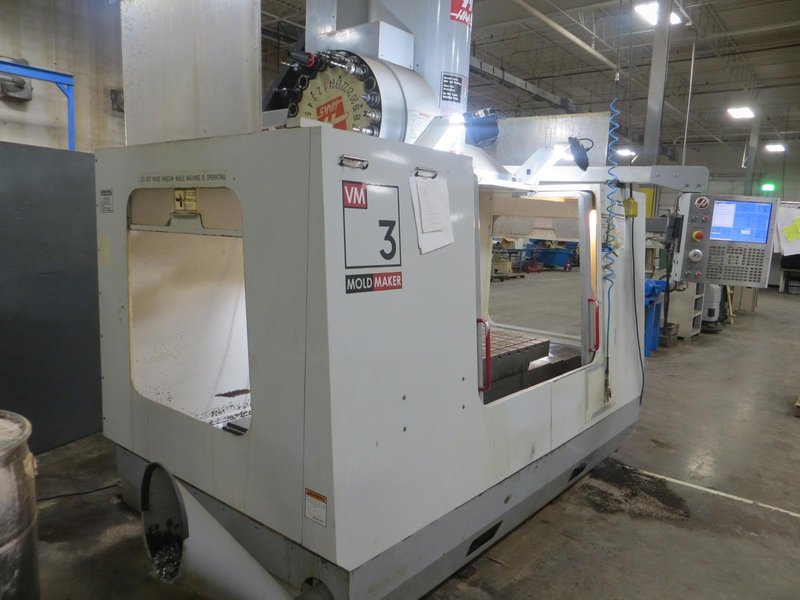 Haas VM-3 CNC Vertical Machining Center w 4th &amp; 5th Axis Brushless Drives, 24+1 ATC, Chip Auger - New Haas Control Installed in 2018- Auction Item