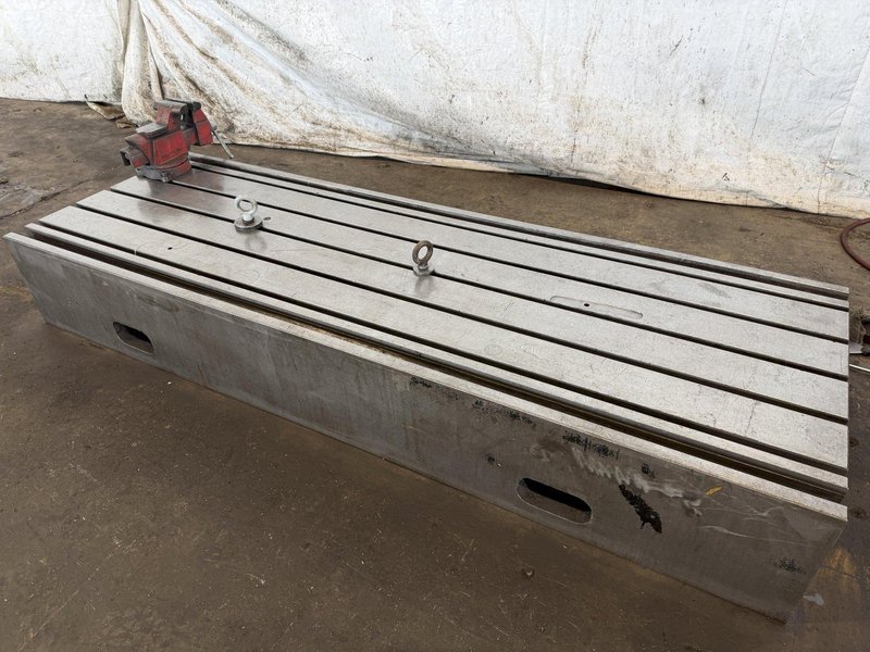28" WIDE x 83" LONG x 12" TALL T-SLOTTED MACHINE RISER TABLE. STOCK # 0433926