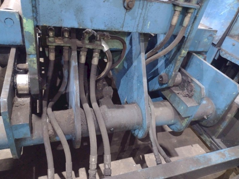 20,000 LBS BRANER HYDRAULIC COIL UPENDER WITH POWER FEED CONVEYOR: YOBRO #25238