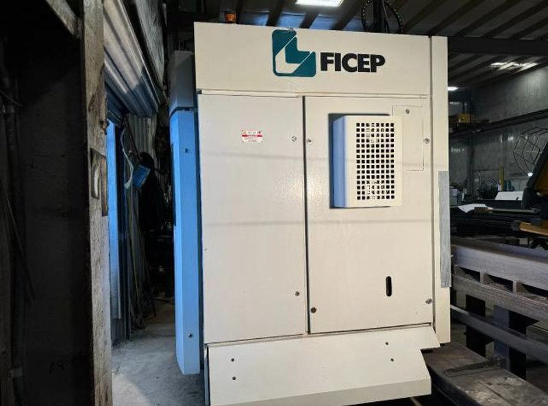 Ficep Excalibur 1201 DE CNC Single Spindle Beam Drill, 2016 – 60′ Roller Table, 6 Station ATC